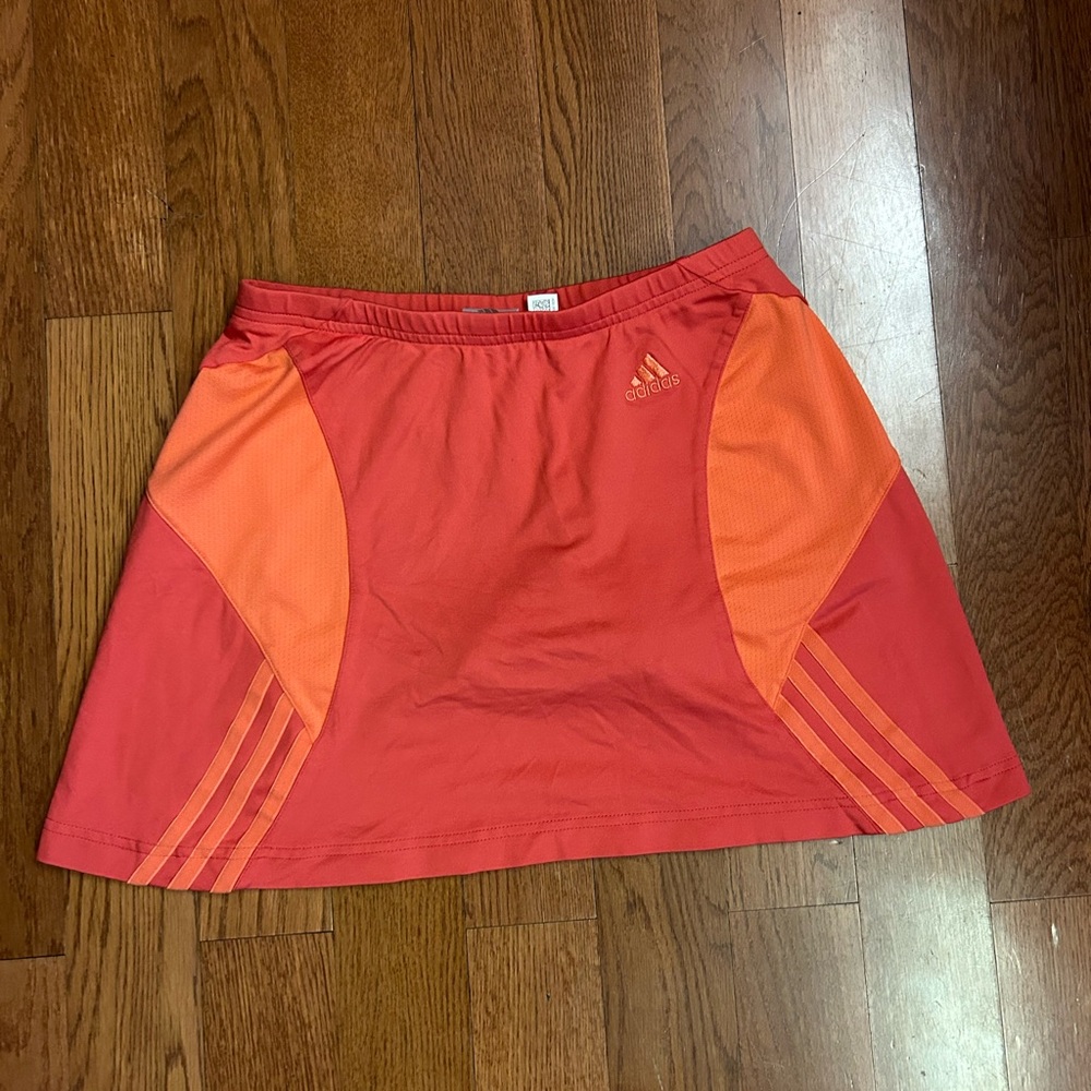 Adidas sports skirt with attached spandex shorts. Size small. EUC